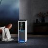Máy lọc khử trùng không khí tháp FUJI SMART AX-M14000 đặt trong phòng khách hiện đại